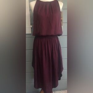 VICI A sleeveless and smocked waist dress in a dark wine hue. RE $69 sz Medium